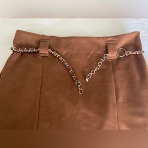 Women’s camel colored mini skirt with belt